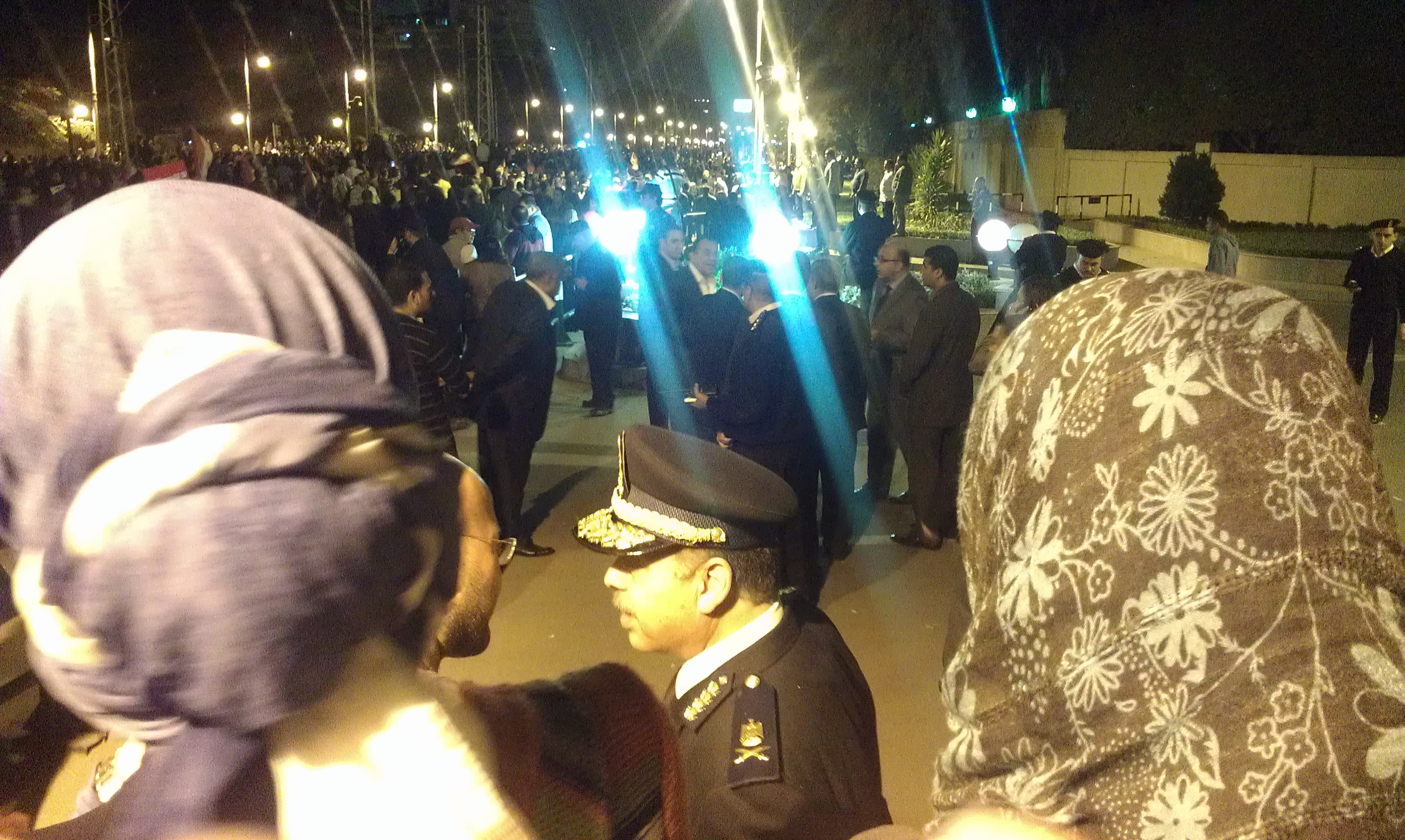 Police Officer talking to protesters.