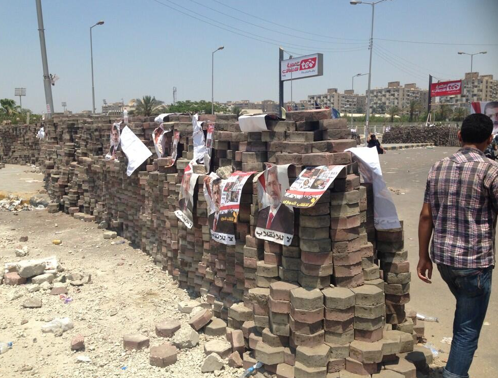 Morsi supporters built a wall to "defend against attacks."