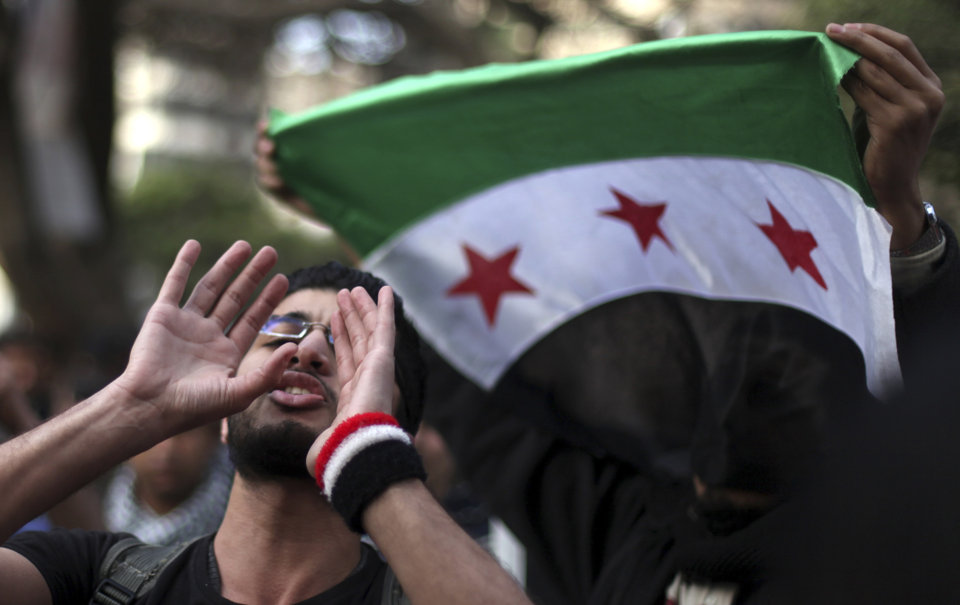 Anti-Assad protesters marched in Egypt earlier this year