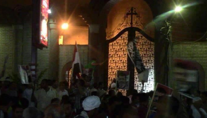Yesterday in Sohag, Islamists barricaded the entrance of a church and hung black "Al-Qaeda" flags on its gate.