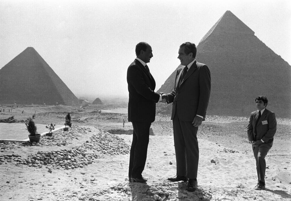 Former Egyptian President Anwar El-Sadat and Former US President Richard Nixon at the Pyramids in 1974 