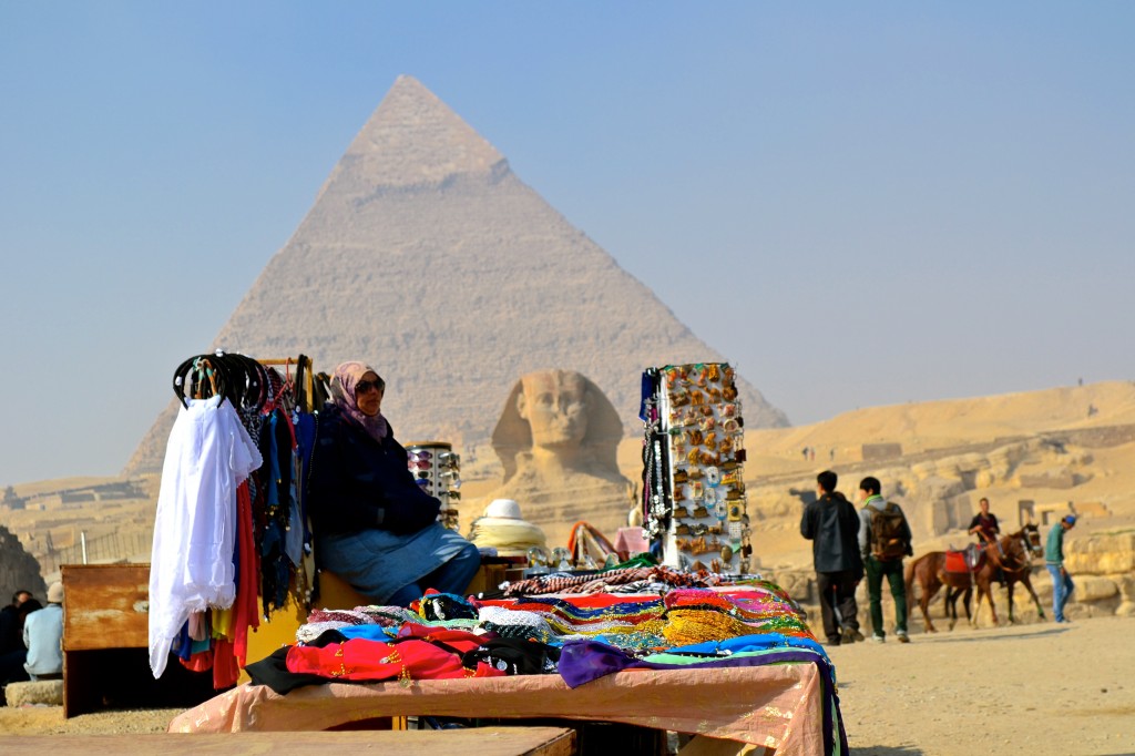 A vendor at the Pyramids with no tourists in sight