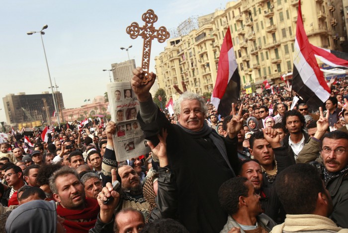 Coptic Christians join with Muslim protesters in a show of unity in Tahrir Square in Cairo, Egypt, Sunday, February 6, 2011. (Carolyn Cole/Los Angeles Times/MCT)