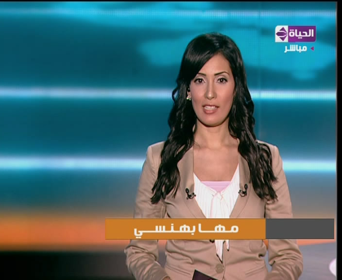 Maha bahnassy an anchorwoman at Tahrir satellite channel.  