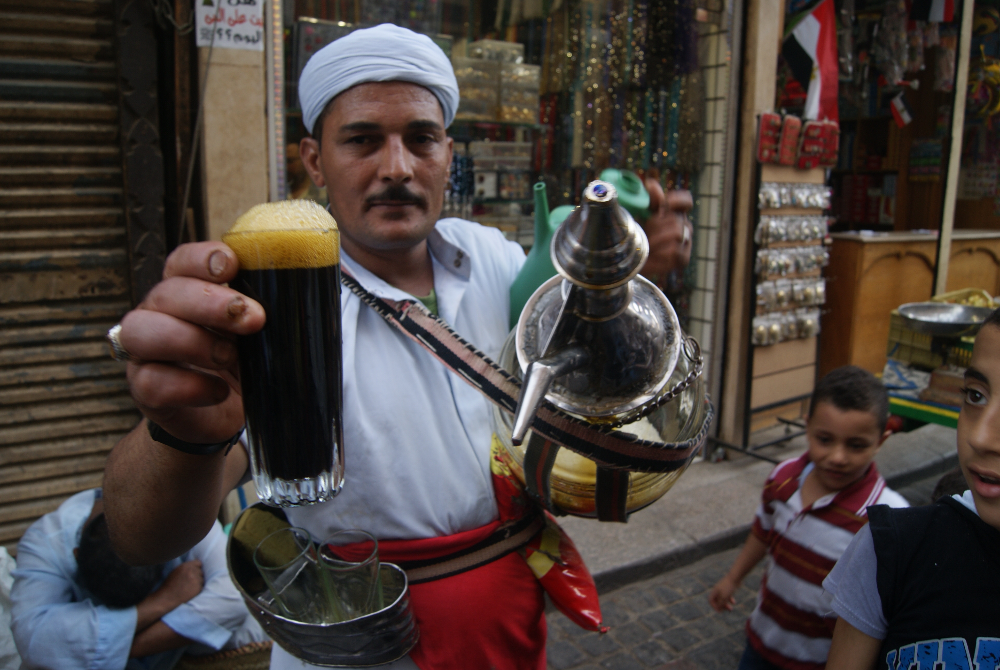 A man selling juice in El Hussein.