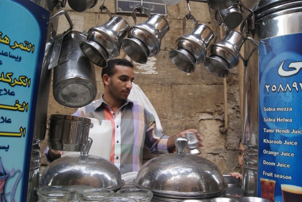 A man selling juice in El-Hussein