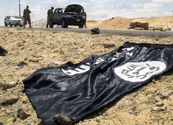 A black Al-Qaeda flag found at the scene of the attack. Credit: AMAY