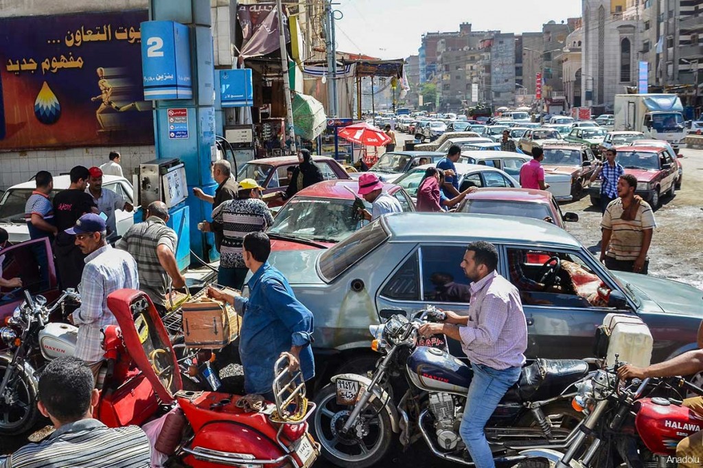Egyptians often face long queues at petrol stations due to a shortage in supply.