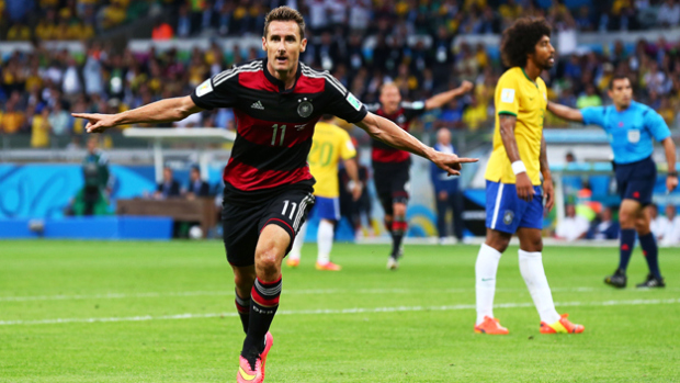 Miroslav Klose of Germany celebrates after scoring his team's second goal during the World Cup semifinal against Brazil