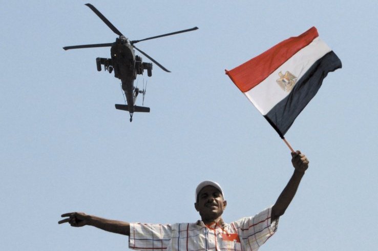 A military helicopter over Tahrir Square in 2013