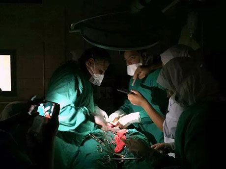 A picture of a surgery being done in Ismailia Hospital during a power cut. 