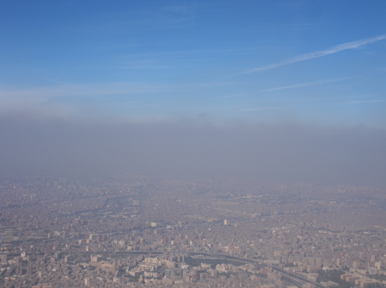 Black cloud as seen from an airplane over Cairo in 2013.