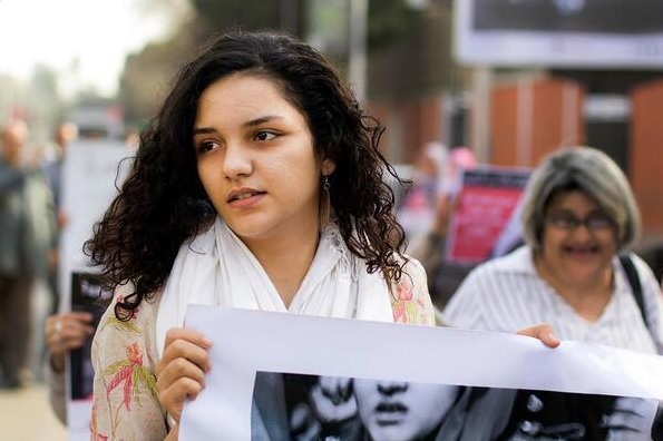 Sanaa Seif, one of 23 sentenced to three years in prison for violating the protest law.