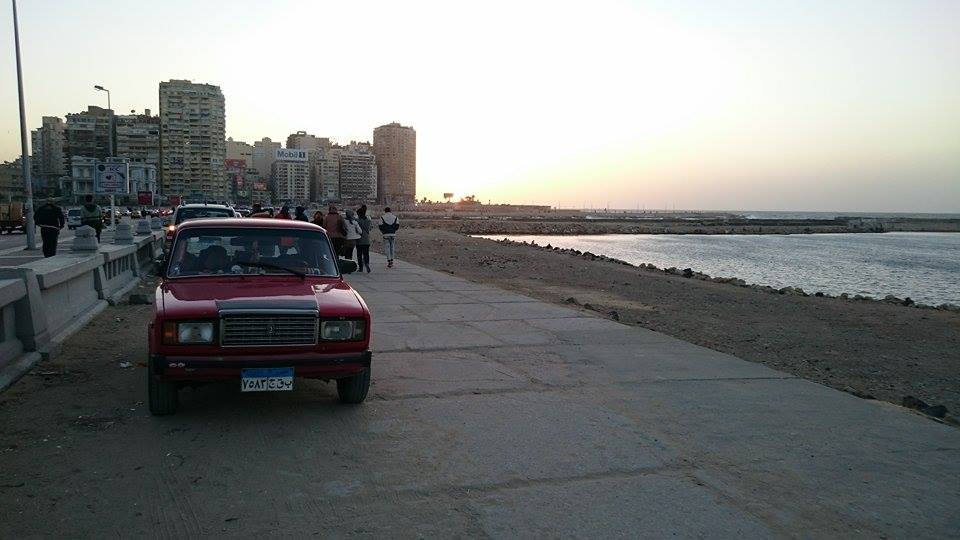 Illegally parked car on the sidewalk along the corniche