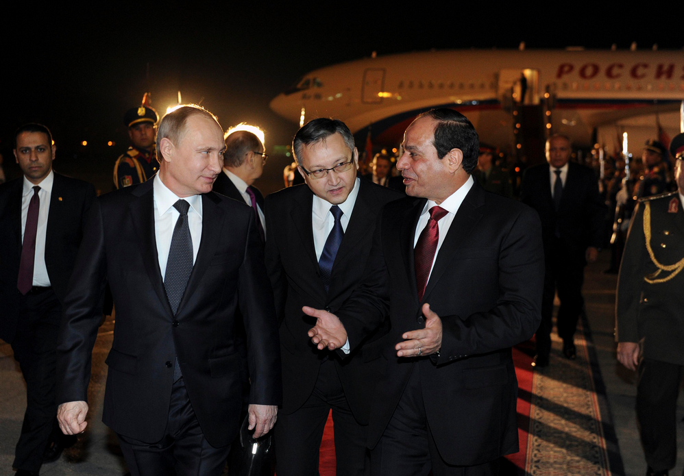 It was all smiles as the Russian President landed in Cairo. REUTERS/Mikhail Klimentyev/RIA Novosti/Kremlin