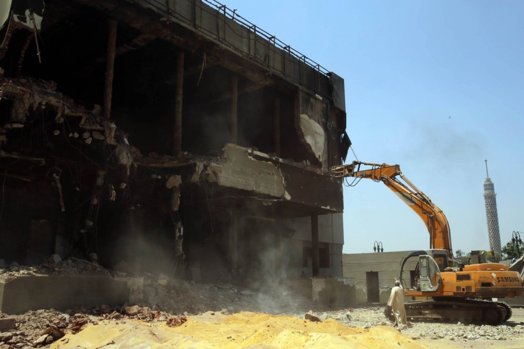The beginning of the demolition of a building belonging to the now defunct National Democratic Party on Sunday, May 31, 2015. ASWAT MASRIYA/Randa Shaath