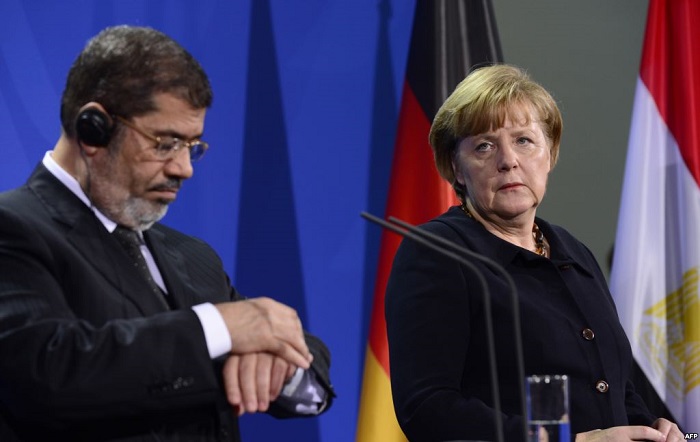 Egypt's deposed President Mohammed Morsi met with Chancellor Merkel during a visit to Berlin in 2013.