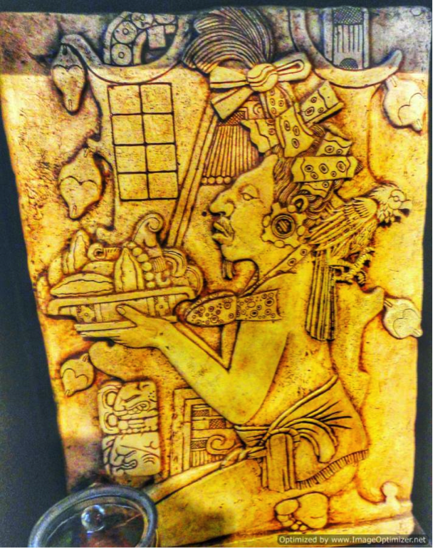 King Montezuma offering cocoa nibbles to Aztec gods