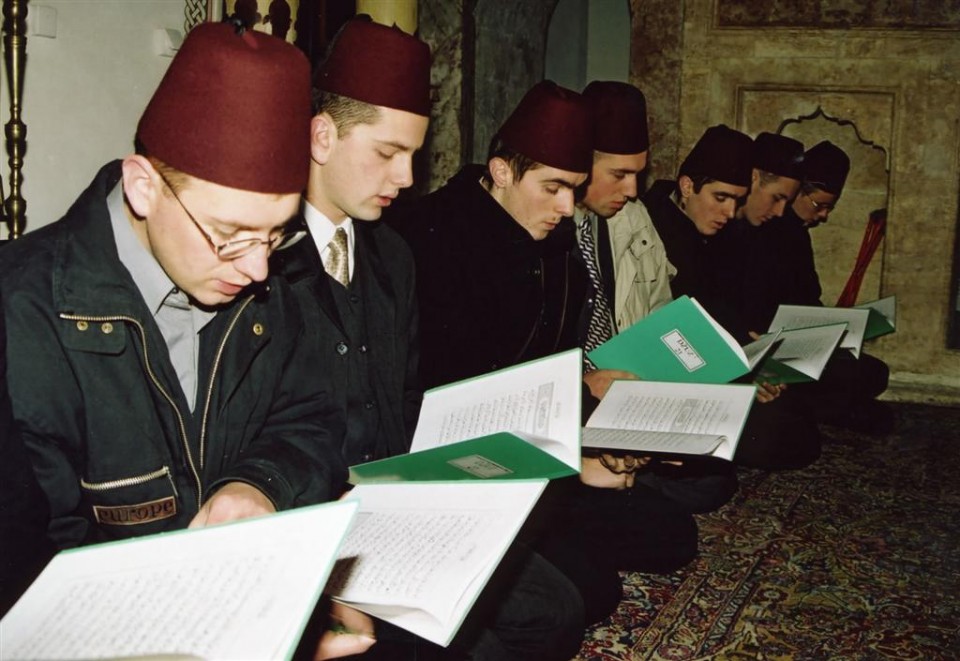 Bosnian young men studying and reciting Quran at the mosque