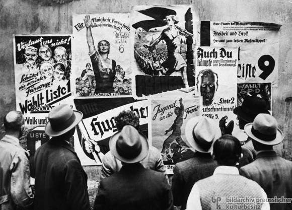A typical campaign scene with Nazi posters on display next to the Center Party, Communists, Socialists and others.