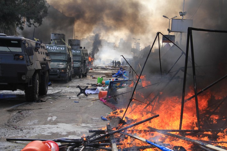 Protesters' tents burn as police moved to disperse the sit-in at Rabaa Al-Adaweya in 2013.