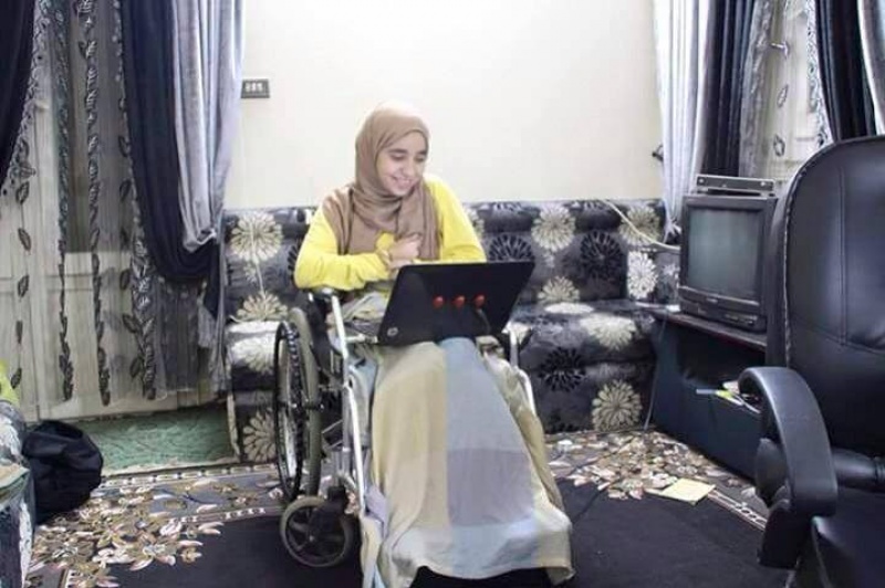 Esraa suffers leg injury due to a bullet wound that struck near her spine in 2014 as she photographed the anniversary of the January 25th revolution.