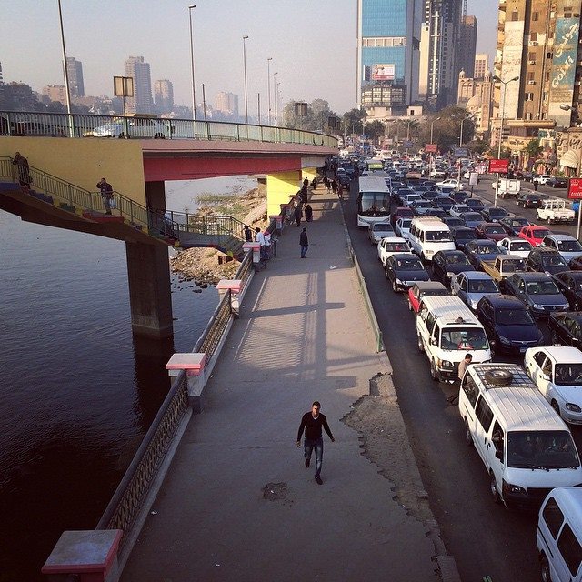 Often times, it makes more sense to just walk than to get stuck in one of Cairo's traffic jams. Photo by Tinne Van Loon
