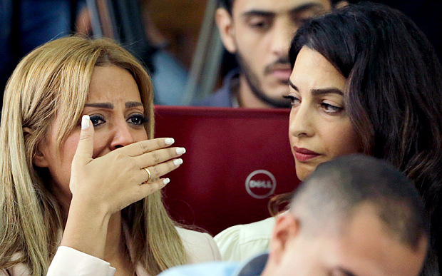 Marwa Fahmy, Mohamed Fadel Fahmy's wife, upon hearing the verdict which sentenced her husband to three years in prison. Photo: Amr Nabil/AP