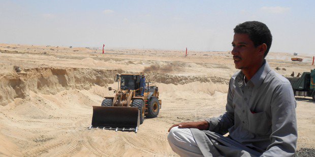 A worker at the site of the New Suez Canal Project