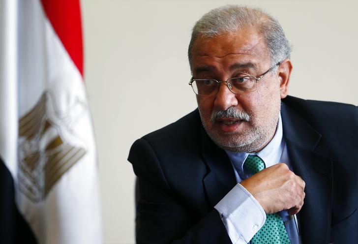Egypt's Petroleum Minister Sherif Ismail talks during an interview with Reuters on investments undertaken by his country, which is facing an energy crisis, at his office in Cairo September 22, 2014.  REUTERS/Amr Abdallah Dalsh