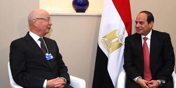 World Economic Forum Founder and Executive Chairman Klaus Schwab (left) with Egyptian President Abdel Fattah El Sisi (right). PHOTO: Youm7