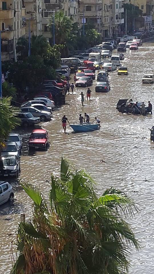 On the flooded streets, fishing boats came in more handy than cars and motor bikes.