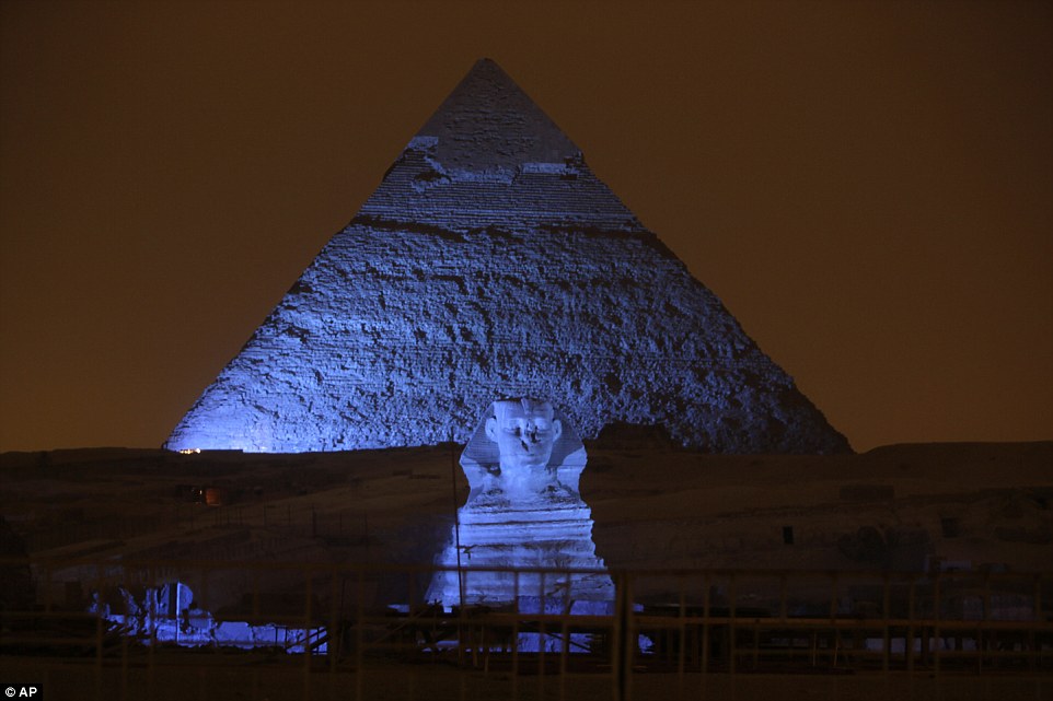 The Sphinx and the three Pyramids of Giza were lit in blue among more than 200 landmarks around the world in celebration of the UN's 70th anniversary. Credit: Amr Nabil/ AP