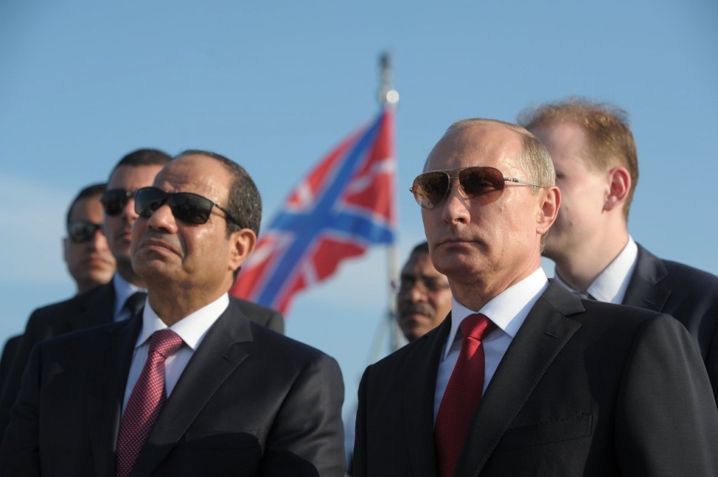 Russian President Vladimir Putin, right, and Egyptian President Abdel Fattah el-Sisi visit the Black Sea Fleet’s missile cruiser Moskva on Aug. 12 in the sea port of Sochi. (Alexei Druzhinin / AFP)