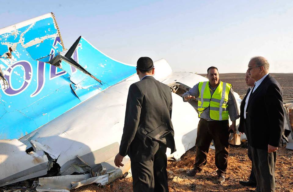 Part of the Russian airplane that crashed in Egypt's North Sinai being inspected by Prime Minister Sherif Ismail. Credit: AP