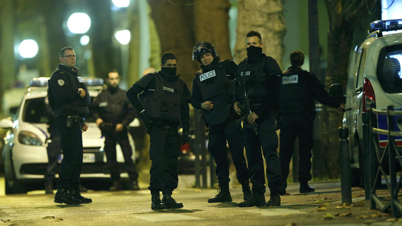 French special police forces secure the area as shots are exchanged in Saint-Denis, France, near Paris, November 18, 2015 during an operation to catch fugitives from Friday night's deadly attacks in the French capital. REUTERS/Christian Hartmann