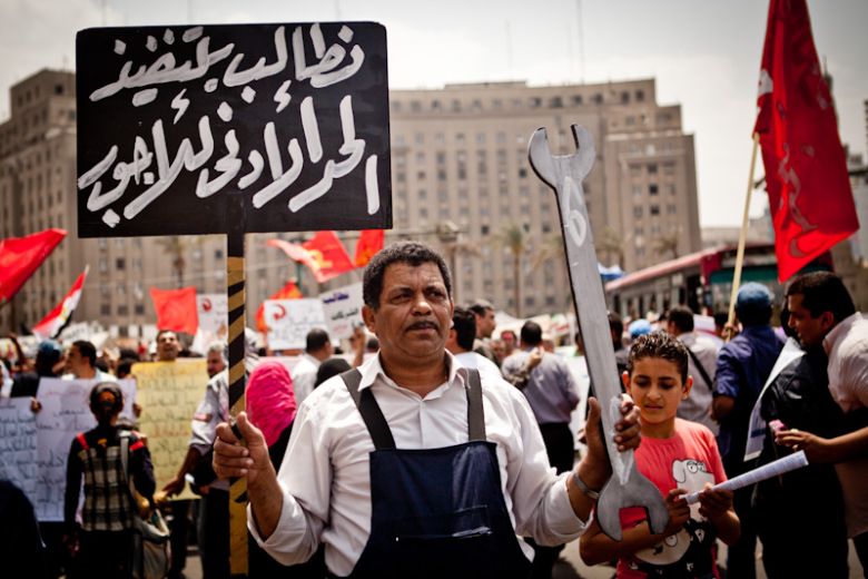 Laborers marched to Tahrir Square and the neighboring Shura Council during the Labour Day 2013. Credit: Virginie Nguyen
