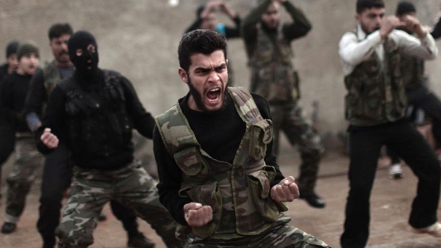 Syrian rebels attend a training session in Maaret Ikhwan near Idlib, Syria. Credit: Muhammed Muheisen/ AP