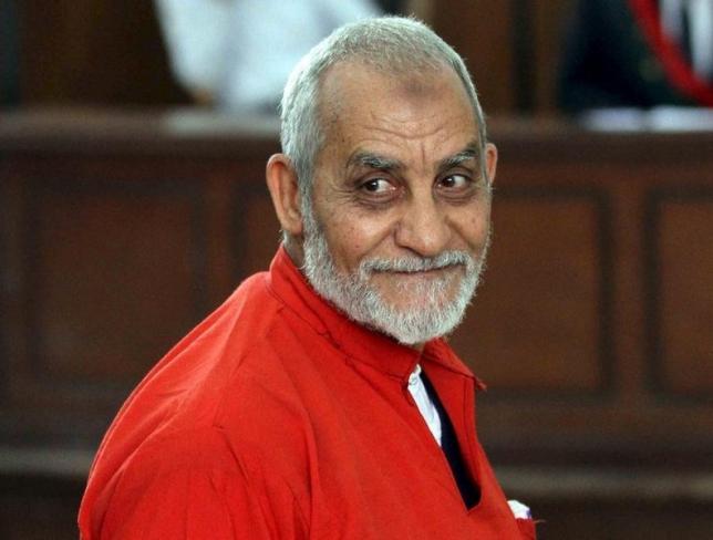 Mohamed Badie, top leader of Egypt's outlawed Muslim Brotherhood, talks during a trial hearing alleging his involvement in a 2013 attack on a Port Said police station, at a court in Cairo, April 20, 2015. REUTERS/Al Youm Al Saabi Newspaper