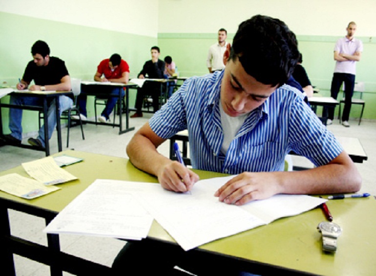 A secondary school student taking his exam in Egypt