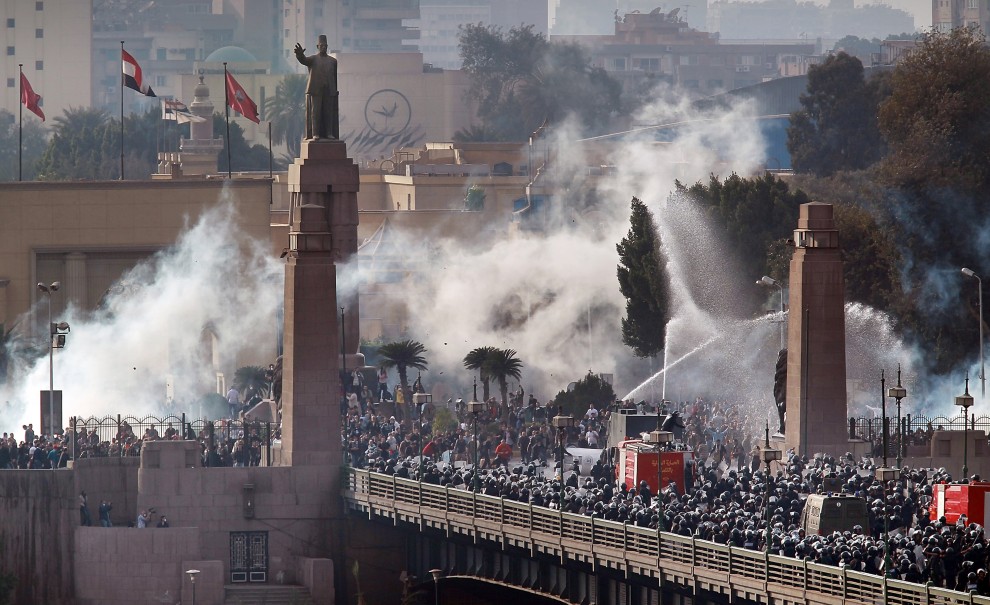 Security forces and protesters clash during the January 25 revolution in 2011.