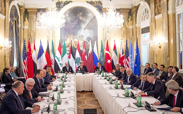 World leaders and diplomats discussing the Syrian situation in Vienna, October 2015
