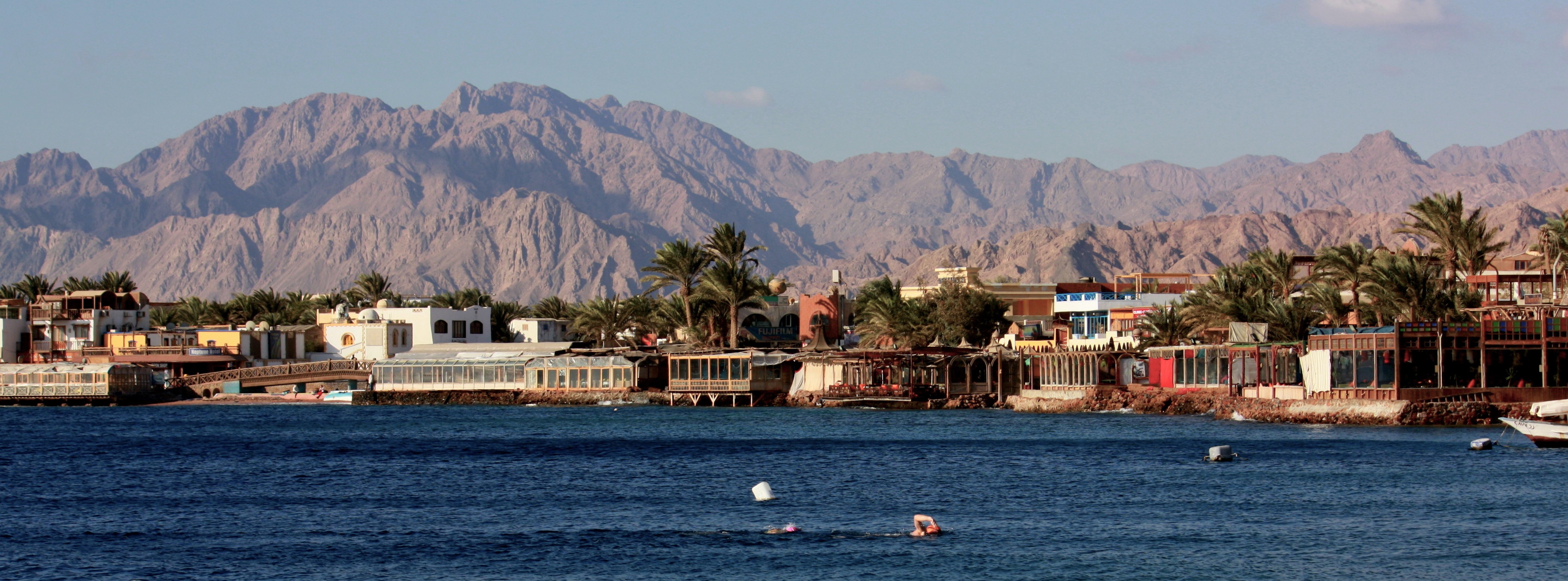 Inns and cafeterias lining the Red Sea in Dahab. Credit: Katia Vastiau