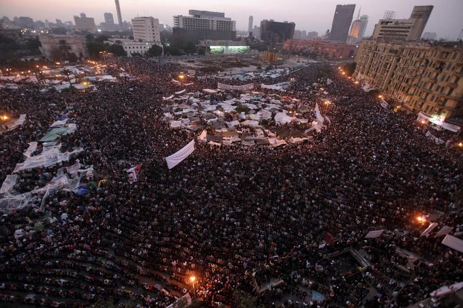 Egyptian anti-government protesters perform the evening prayers as they gather at Cairo's Tahrir square on February 8, 2011. Photo: Patrick Baz, AFP/Getty Images