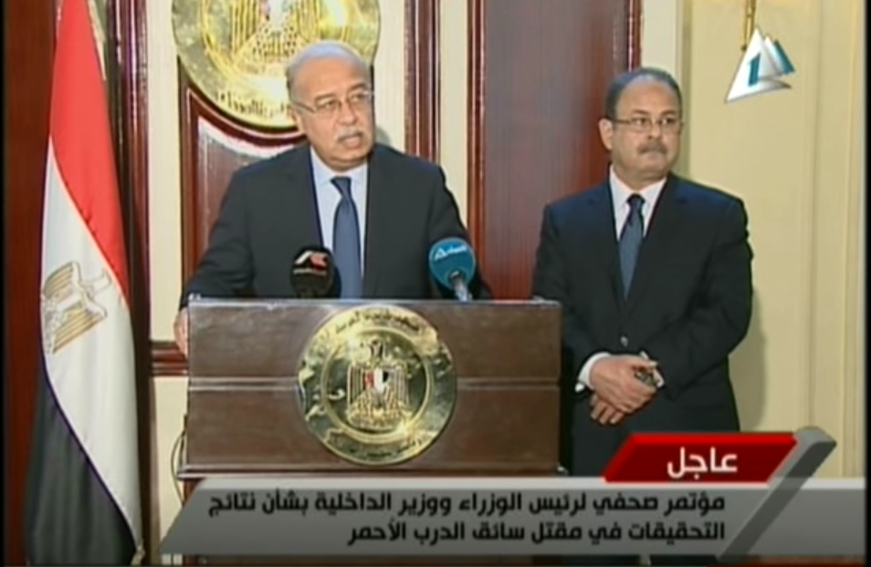 Prime Minister Sherif Ismail (left) at a press conference with Minister of Interior Magdy Abdel Ghaffar (right)