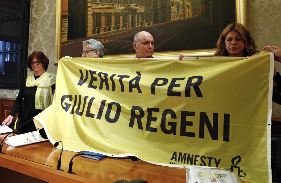 (From L to R) Paola Regeni, Senator Luigi Manconi, Claudio Regeni and lawyer Alessandra Ballerini hold a banner reading "Truth for Giulio Regeni", the Italian student murdered in Egypt, during a news conference at the upper house of the parliament in Rome, Italy, March 29, 2016. REUTERS/Remo Casilli