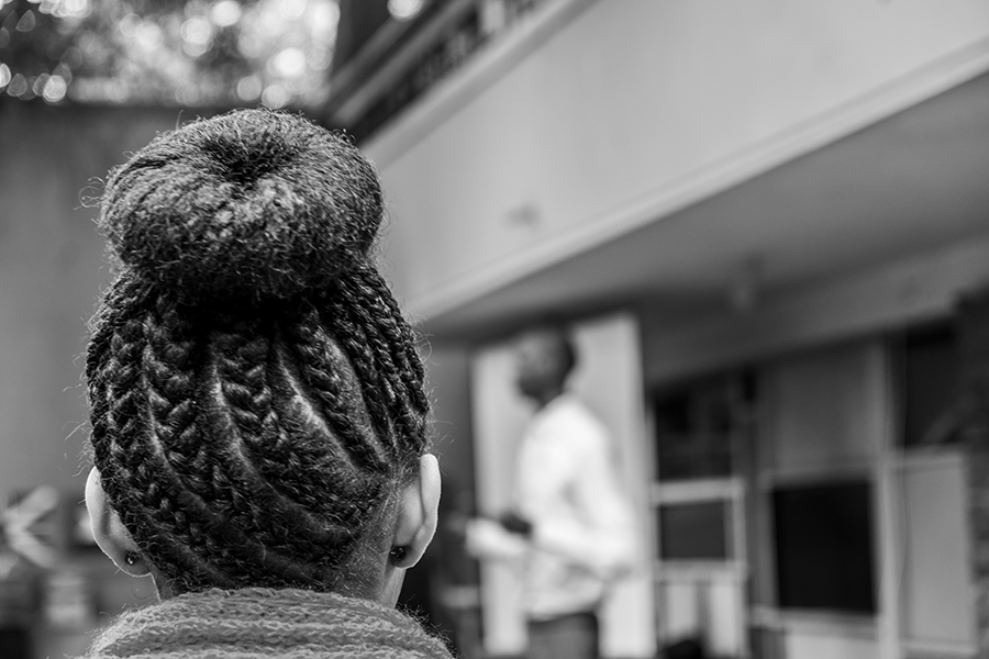 A girl stands in the morning line at AHLC displaying beautifully braided hair