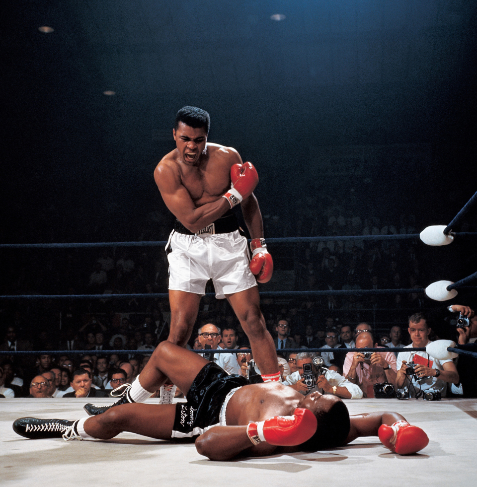 Muhammad Ali after first round knockout of Sonny Liston during World Heavyweight Title fight at St. Dominic's Arena in Lewiston, Maine