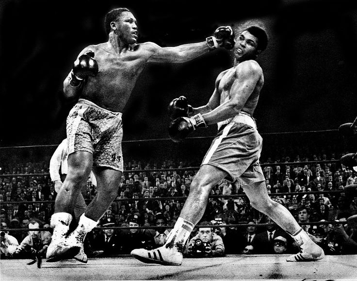 Joe Frazier lands his trademark left hook on Muhammad Ali 