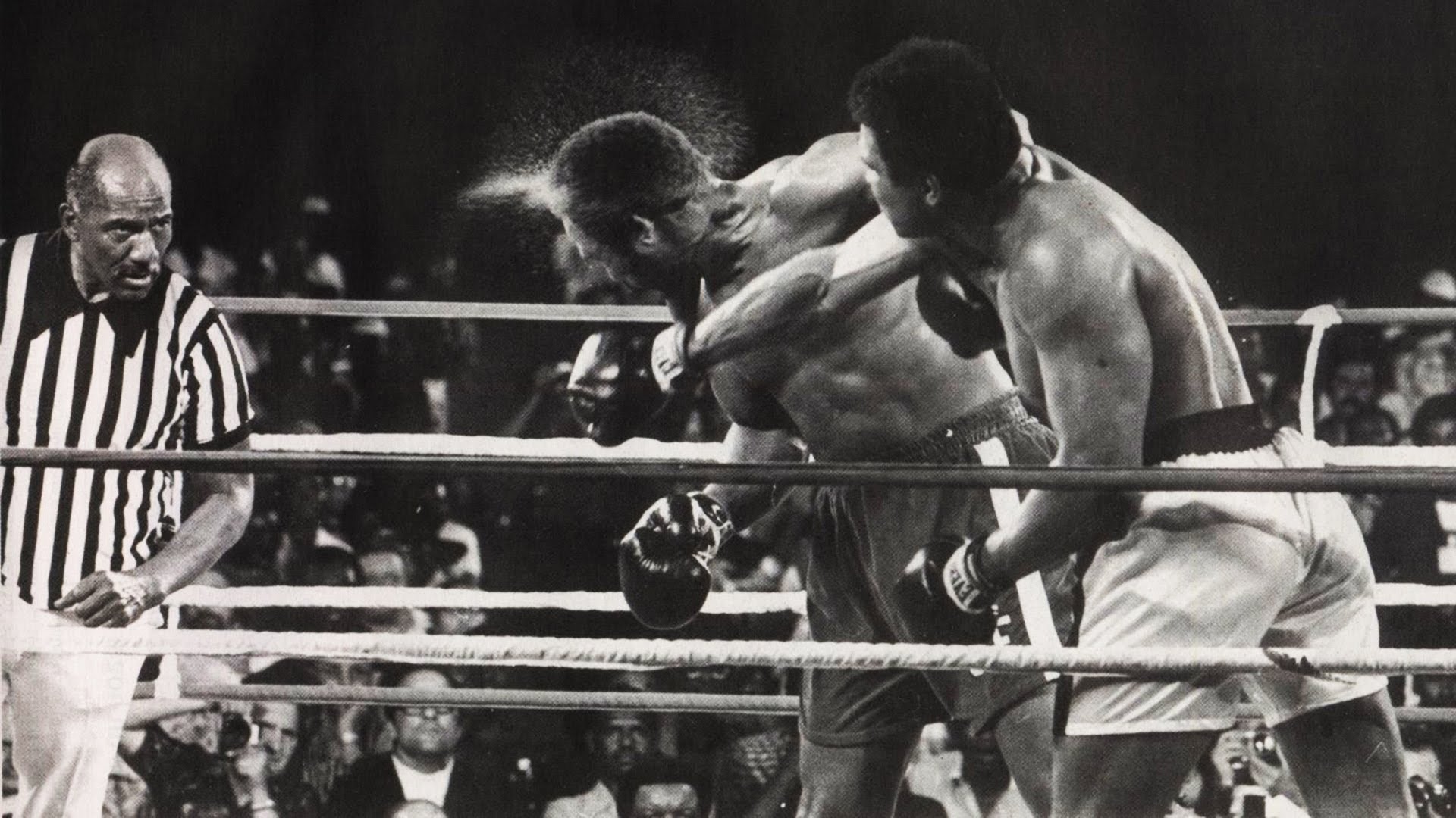 Ali lands a quick right lead on George Foreman in the Rumble in the Jungle 